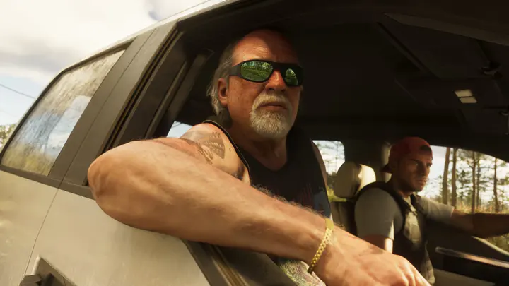 Brian Heder في سيارة في لقطة رسمية من GTA VI